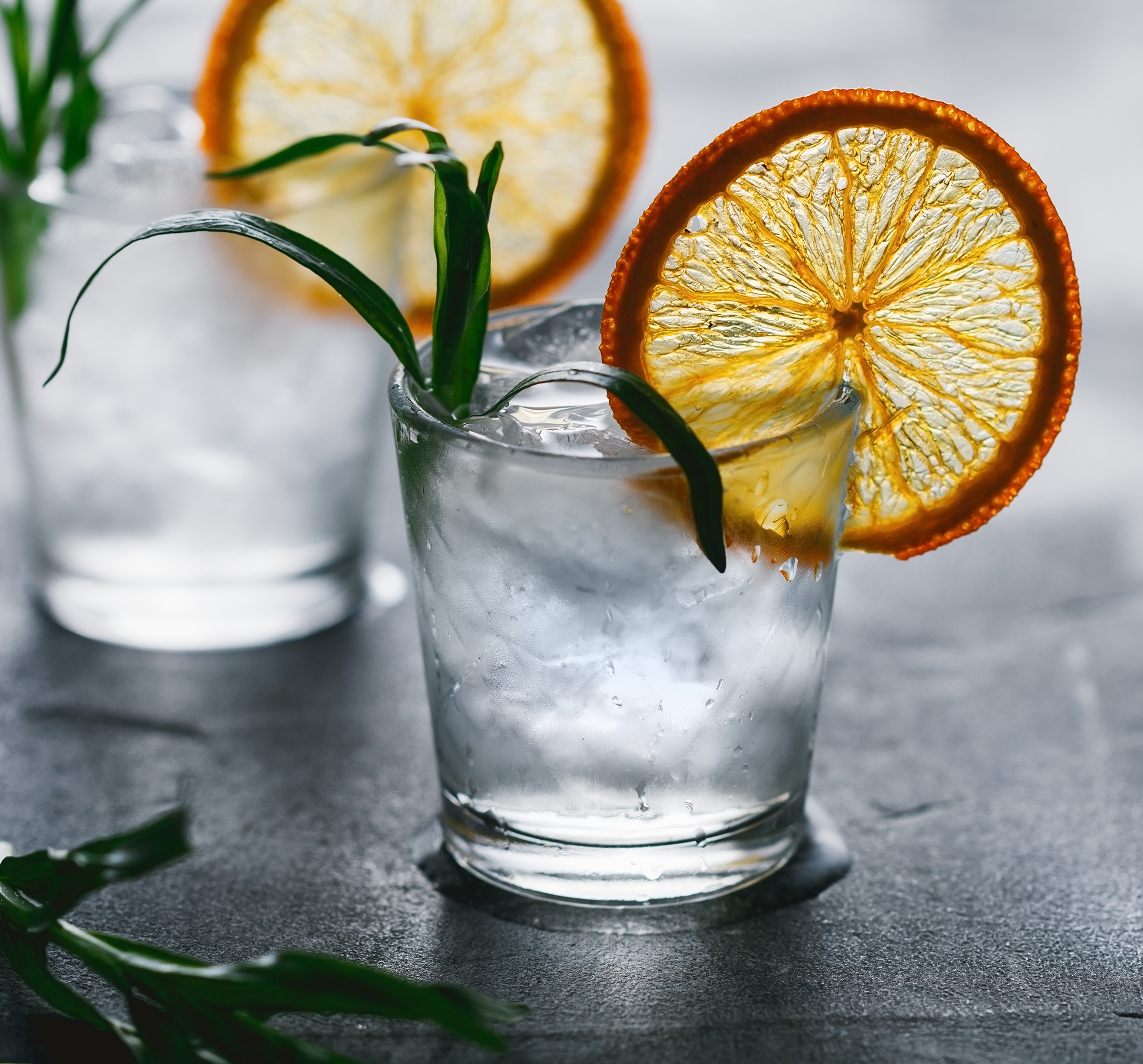 Vodka mit Orangenscheibe